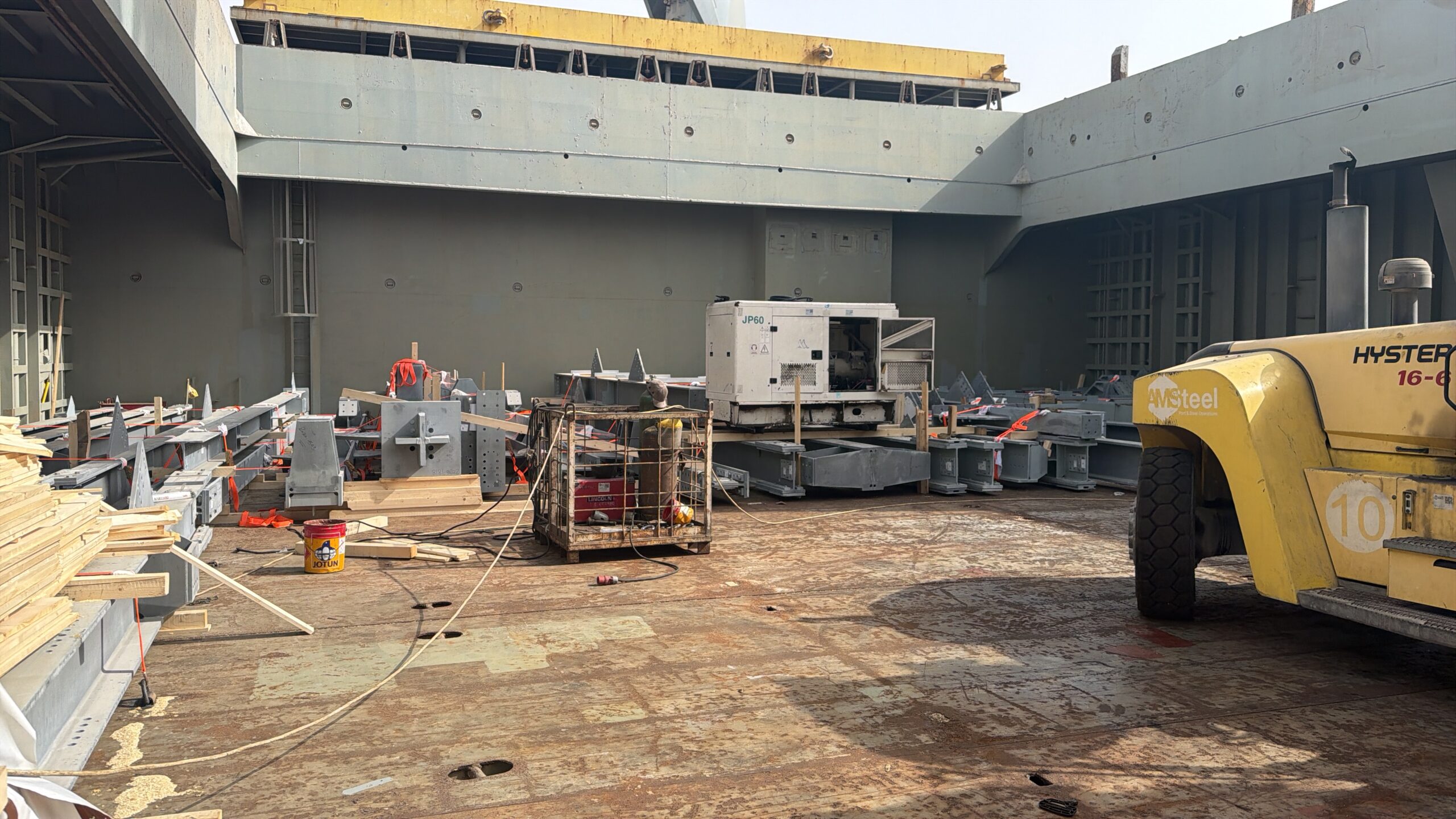 Fabricated steel structures marshalled in the laydown area at King Abdullah Port before loading