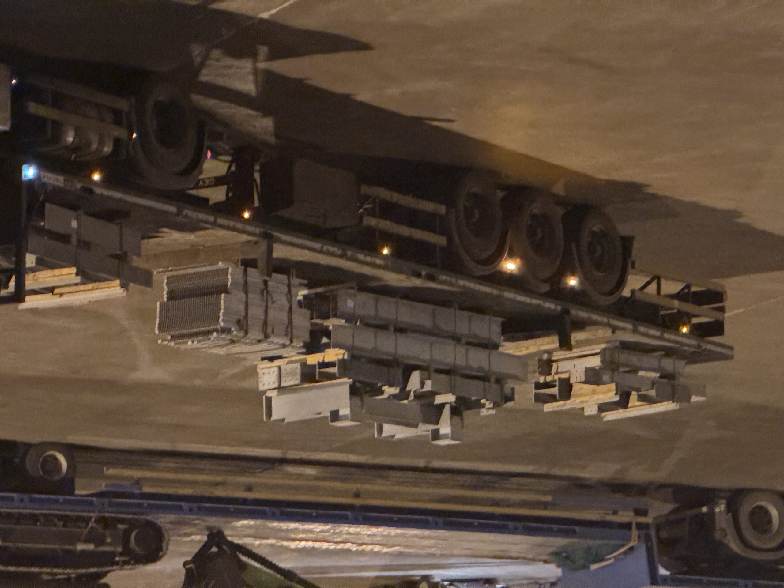 Fabricated steel structures arriving by road trailer at King Abdullah Port before loading