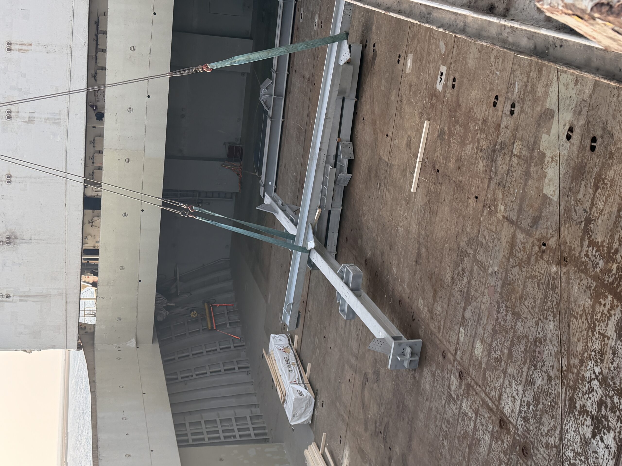 Fabricated steel structure lowered into the cargo hold of M/V Thorco Liva on the vessel crane